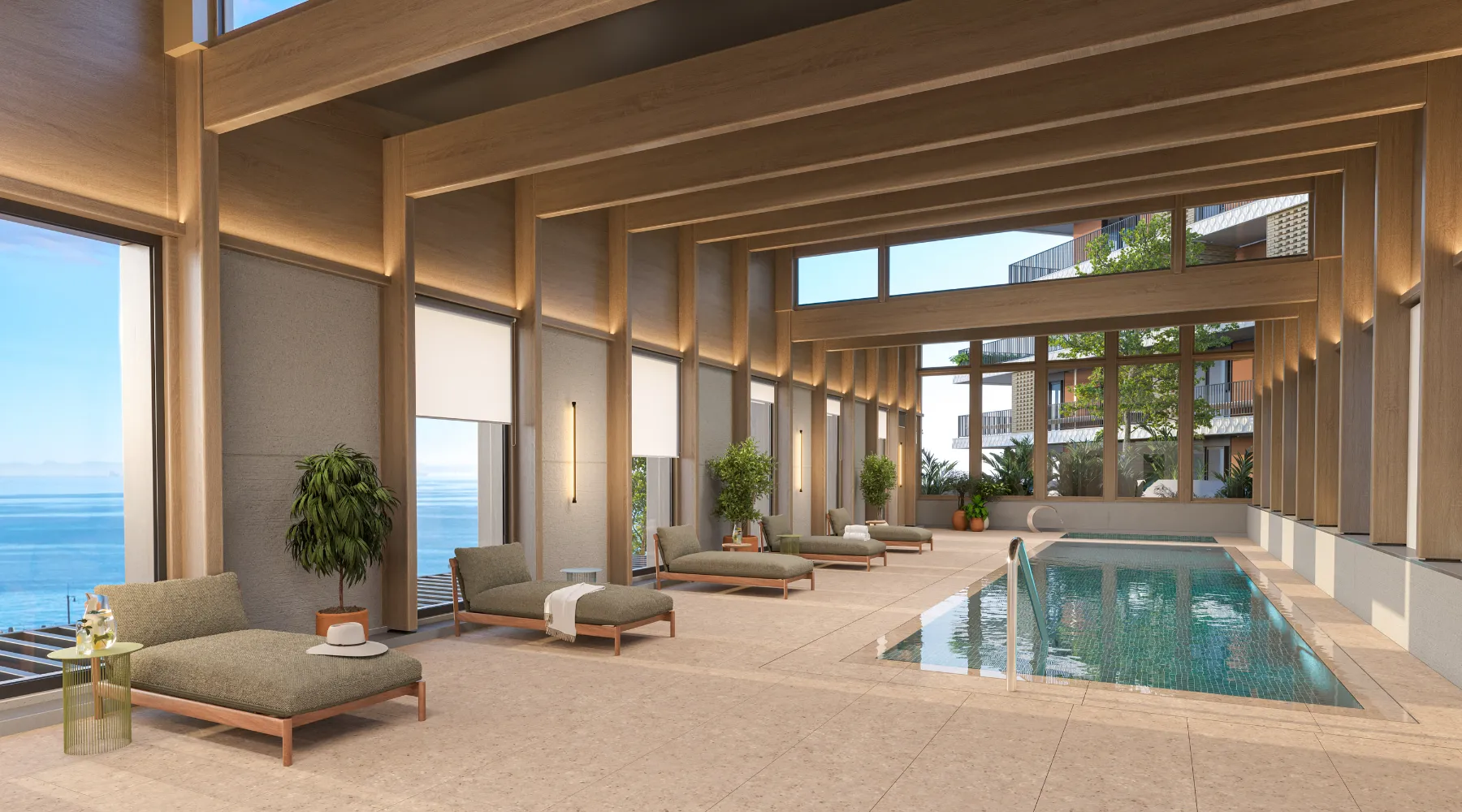 The Bower&rsquo;s indoor heated pool and loungers, overlooking the sea